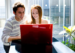 Couple Researching Rentals Online